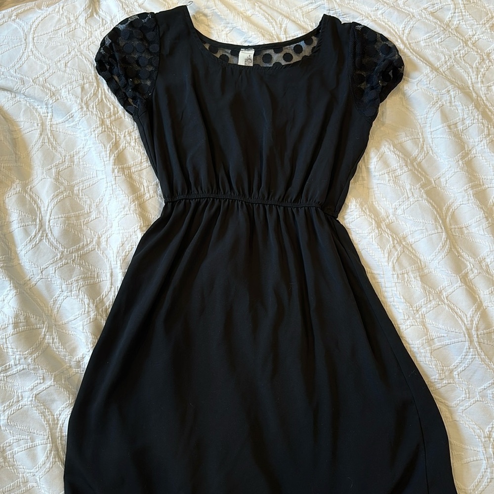 Black dress with polka dot lace detailing Small